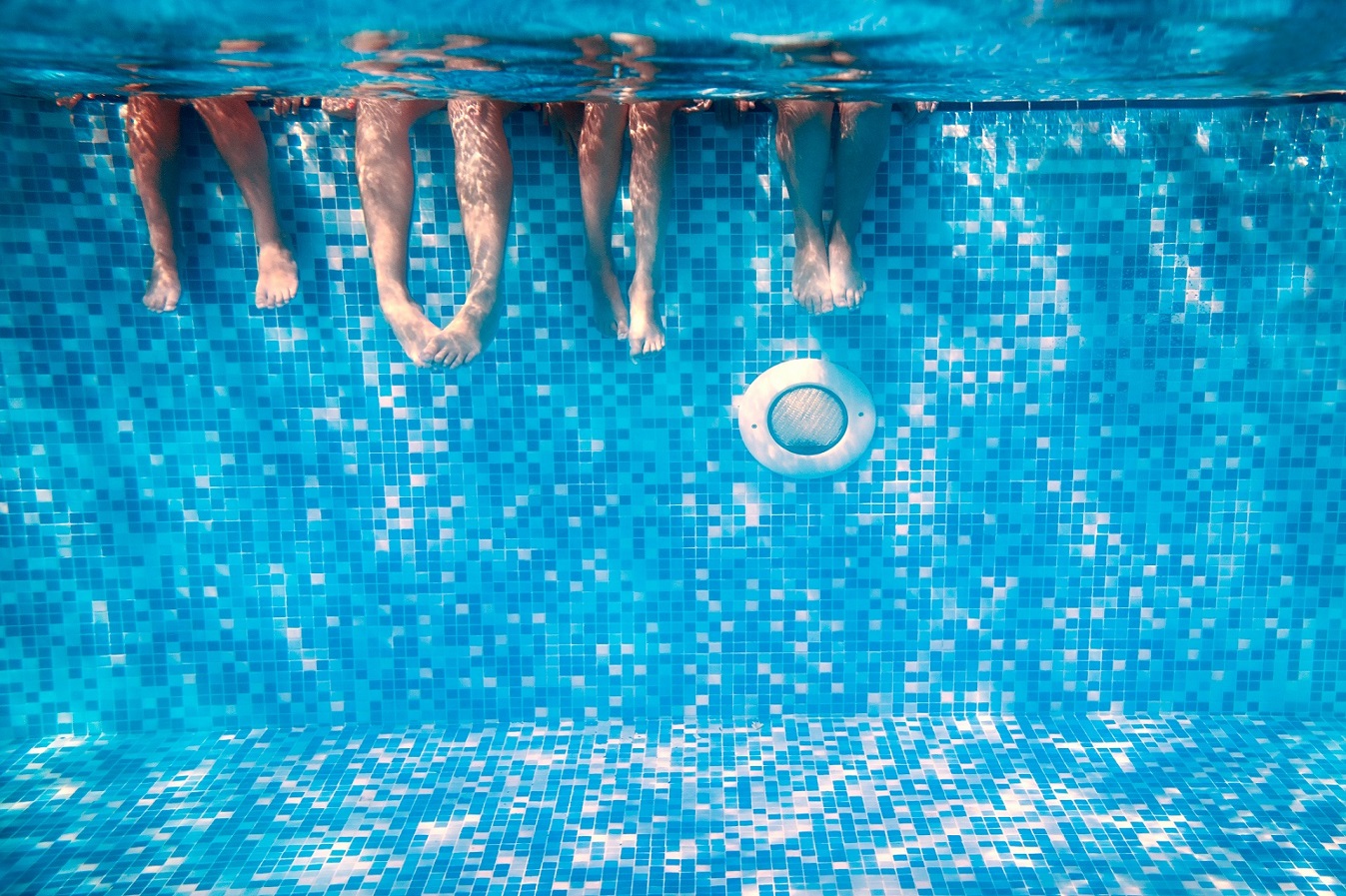 Swimming pool water treatment